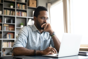 man using laptop